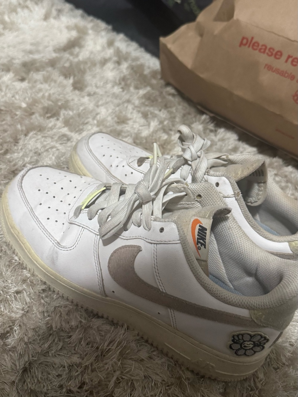 Nike Kids White Sneakers with Beige Swoosh and Orange Tag